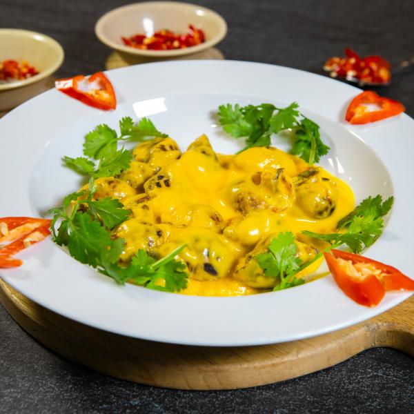 Ốc hương xào bơ cay